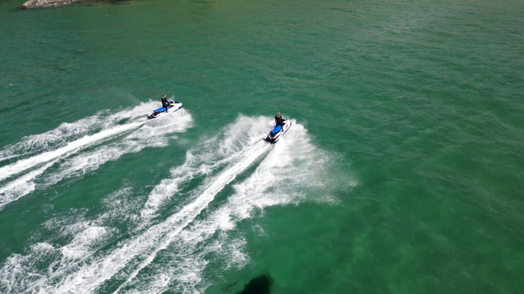 Aerial drone photo of jet skis on the sea